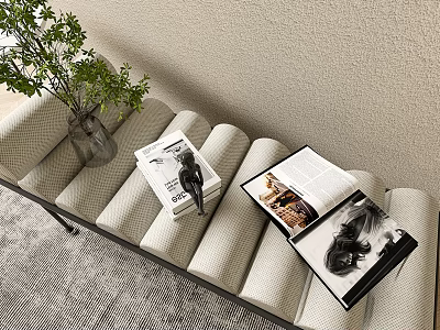 Beige Quilted Footstool with Green Plant Glass Vase and Open Magazines in Living Room 3d model
