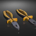 Two Heavy Duty Pliers With Yellow Handles And Metal Jaws For Hardware Tools