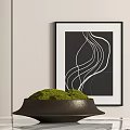 Lush Green Moss In Black Decorative Bowl With Abstract Wall Art In Modern Interior