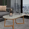 Oval White Coffee Table with Vase Dried Flowers Small Teacup Books and Wooden Legs