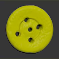 Round Yellowish Object With Multiple Holes And Rough Surface On Gray Background