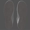 Pair of White Leather Low Top Sneakers With Lace Up Design And Comfortable Sole