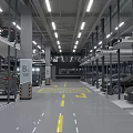 Indoor Multi Level Parking Garage With Parked Cars Signage Yellow Lines Arrows And Bright Lighting