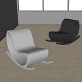 Modern White And Black Rocking Chairs With Minimalist Design On Light Wooden Floor
