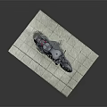 Black Cruiser Motorcycle With Red Accents On Gray Stone Pavement