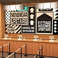 Store Front Desk With Menswear Fitting Rooms Family Closet Signs And Arrows Upstairs