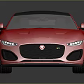 Red Jaguar Convertible Sports Car With Sleek Body And Black Roof