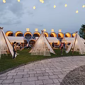 Outdoor Garden Ornaments With White Tents Palm Trees Stone Paths And Wooden Benches