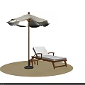 Outdoor Gray Lounge Chair On Sand Surface With Matching Umbrella And Wooden Side Table