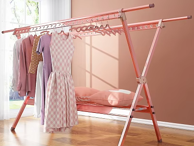 Pink Metal Clothes Drying Rack with Hanging Clothes and Pillow in Bright Indoor Space 3d model