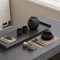 Elegant Tea Set With Black Teapot Small Cups Tray Mat And Chopsticks On Wooden Table