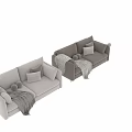 Beige And Gray Upholstered Sofa Interior With Pillows Blanket And Pom Poms