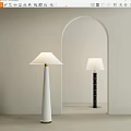 Modern Floor Lamps with White and Black Bases and White Shades in Arched Doorway Interior