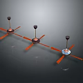 Three Modern Ceiling Fans with Orange Blades and Black Motors for Home Use