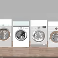 Four White Front Load Washing Machines In Laundry Room With Wooden Floor And Light Wall