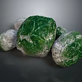 Natural Green and Gray Stones with Rough Textured Surfaces in Original Form