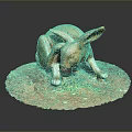 Bronze Rabbit Sculpture in Crouching Position on Circular Base with Grass and Dirt Details