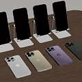Apple iPhones On Stands And Laid Flat With Colorful Screens And Various Colors