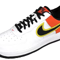 White Sneakers With Orange Yellow Accents Black Laces Swoosh Logo And Black Sole