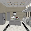 Commercial Kitchen With Stainless Steel Equipment Worktables Range Hoods And Tiled Surfaces