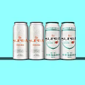 Stylish SUPTA Four White Canned Beverages on Light Blue Background