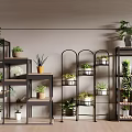 Indoor Bonsai Potted Plants Display On Multiple Metal Shelves With Various Greenery