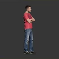 Young Man In Red T-Shirt And Blue Jeans Standing With Arms Crossed On Gray Background