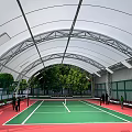 Fitness Sports Venue With White Roof Structure Green Fencing And Outdoor Grass Area