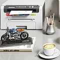 Home Office Desk Setup with Printer Green Plants Photo Frames Dumbbell Coffee Cup