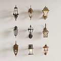 Various Decorative Wall Lamps With Different Designs Displayed On White Wall