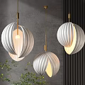 Stylish White And Gold Striped Pendant Lights Hanging In Gray Wall Background With Green Plants
