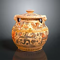 Traditional Carved Clay Jar With Intricate Animal Patterns And Decorative Sculptures