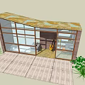 Modern Small Building With Glass Walls Wooden Structure Deck And Cactus Greenery Plants