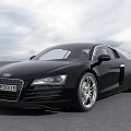 Black Audi R8 Sports Car With Sleek Exterior Design And Stylish Alloy Wheels