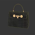 Elegant Black Suede Handbag With Golden Clasps And Structured Top Handle Design