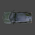 Olive Green Mini Countryman SUV With Black Roof Stripes UK License Plate And Black Wheels