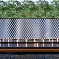 Modern Landscape Wall With Geometric Checkerboard Design Illuminated Lights And Green Trees Background