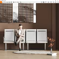 Public Chair With Metal Grid Design In Indoor Lobby With Man Sitting