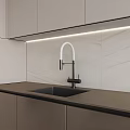 Stylish Cabinets In Modern Kitchen With Marble Countertop Island And Under Cabinet Lighting