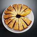 Golden Sliced Round Cake Served On White Plate With Dark Background