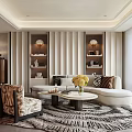 Modern Elegant Living Room Interior With Beige Curved Sofa Round Coffee Table And Geometric Rug