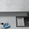 Smart Robot Cleaning Kitchen Sink With Blue Cloth And Stainless Steel Surface In Modern Kitchen
