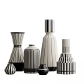 Stylish Ceramic Vessels With Black And White Stripes And Various Shapes And Modern Design