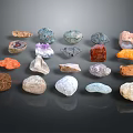 Natural Stone Materials with Various Colors and Different Shapes Arranged on Black Background