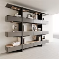 Modern Layered Bookshelf Design With Books Photo Frames And Decorative Sculptures