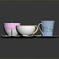 Colorful Tea Cups Saucers and Spoons with Pink Blue White Patterns and Gold Trim