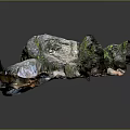 Natural Rock Scene With Moss Covered Stones Dirt And Small Stream