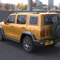 Yellow Retro Style SUV With Tough Design Black Accents Front Grille And Round Headlights