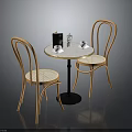 Modern Round Table With White Top And Black Legs Paired With Wooden Curved Back Chairs