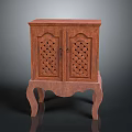 Vintage Wooden Cabinet With Intricate Carved Doors And Elegant Curved Legs
